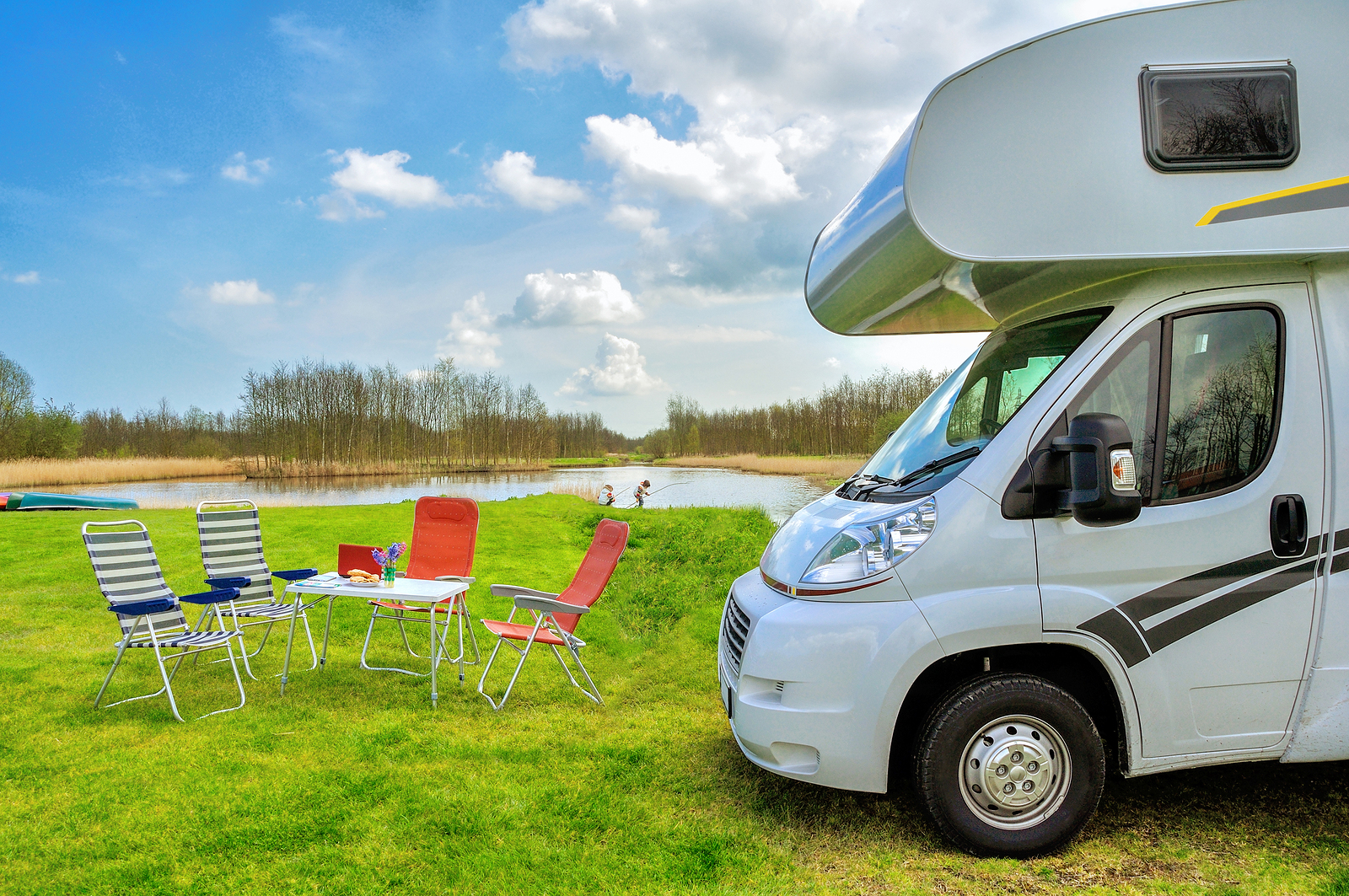 RV (camper) in camping, family vacation travel, holiday trip in motorhome