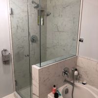 Custom fit glass shower enclosure